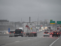 Heavy rainfall is impacting travel in Indianapolis, Indiana, United States, on January 9, 2024. The heavy downpours are affecting roadways a...