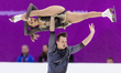 Maria Pavlova and Alexei Sviatchenko are performing during the pairs free skating event at...