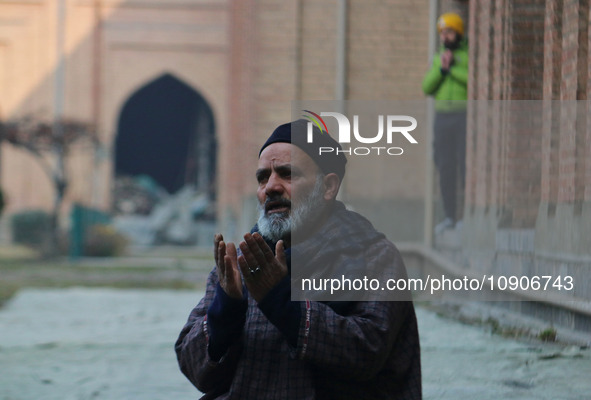 A man is praying at the Jamia Masjid, or Grand Mosque, in Srinagar, Kashmir, India, on January 12, 2024. Special congregational prayers know...