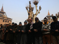 Kashmiris are offering special prayers in the compound of Jamia Masjid, or Grand Mosque, in Srinagar, Kashmir, India, on January 12, 2024. T...