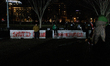 Graffiti is seen on crowd control barriers outside of the White House in Washington, D.C....