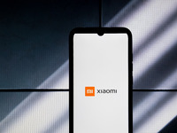 The Xiaomi logo is displayed on a smartphone screen in Athens, Greece, on January 19, 2024. (