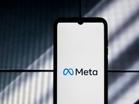 The Meta logo is displayed on a smartphone screen in Athens, Greece, on January 19, 2024. (