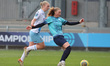 Paige Culver of the London City Lionesses is under pressure from Elise Hughes of Crystal P...