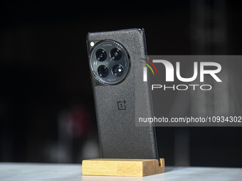 A OnePlus 12 smartphone is on display during its launch event in New Delhi, India, on January 23, 2024. (