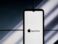 The App Store logo is displayed on a smartphone screen in Athens, Greece, on January 24, 2024. (