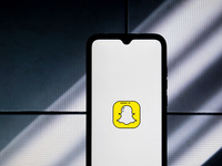 The Snapchat logo is displayed on a smartphone screen in Athens, Greece, on January 24, 2024. (