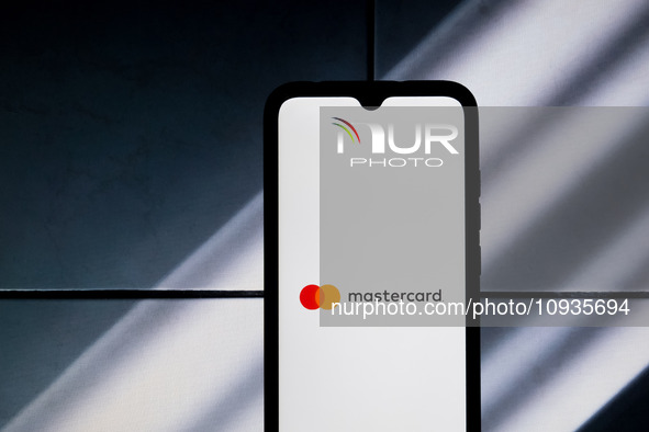 The Mastercard logo is displayed on a smartphone screen in Athens, Greece, on January 24, 2024. 
