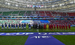 The teams from Japan (L) and Indonesia (R) are lining up before the AFC Asian Cup 2023 mat...
