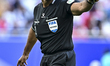 Qatari referee Khamis Mohammed Al-Marri is gesturing during the AFC Asian Cup 2023 match b...