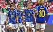 Japan's players are celebrating after their second goal during the AFC Asian Cup 2023 matc...
