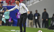 Head Coach Shin Tae Yong of the Indonesia National Team is reacting during the AFC Asian C...