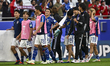 Players from Japan are celebrating their victory in the AFC Asian Cup 2023 match between J...
