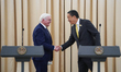 Thai Prime Minister Srettha Thavisin and German President Frank-Walter Steinmeier are shak...