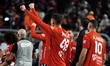 The Egyptian players are celebrating after scoring a goal at the Cairo Stadium Hall in Cai...