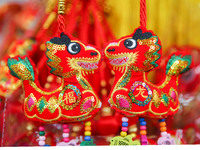 Dragon-themed decorations are being displayed at a small commodity market in Lianyungang, China, on January 27, 2024. (
