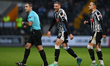 Aden Baldwin of Notts County is smiling after being shown a yellow card by Referee Alex Ch...