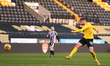 Sam Foley of Barrow is shooting at goal during the Sky Bet League 2 match between Notts Co...