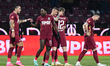 Players of CFR Cluj are celebrating after scoring during the Romania Superliga stage 23 ma...
