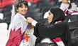Fans of Qatar are cheering before the start of the AFC Asian Cup 2023 round of 16 match be...