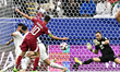 Hasan Al Haydos (#10) of Qatar is securing the goal during the AFC Asian Cup 2023 round of...