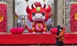 Tourists are viewing lanterns to celebrate the upcoming Spring Festival in Qingzhou Ancien...