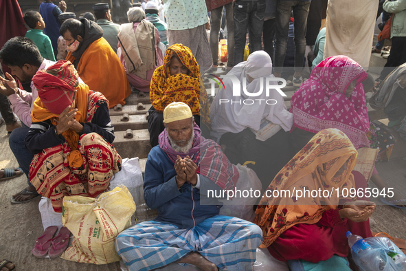 Muslim devotees are offering prayers as they participate in the Akheri Munajat, or final prayers, during 'Biswa Ijtema', an annual congregat...