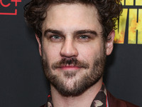 Grey Damon arrives at the Los Angeles Premiere Of AMC+'s 'The Walking Dead: The Ones Who Live' Season 1 held at the Linwood Dunn Theater at...