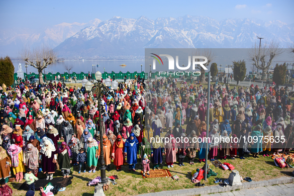 People are praying at the Hazratbal shrine on the day of Mehraj ul Alam in Srinagar, Indian Administered Kashmir, on February 8, 2024. 