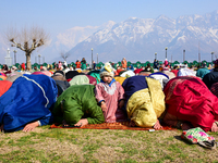 People are offering prayers at the Hazratbal shrine on the day of Mehraj ul Alam in Srinagar, Indian Administered Kashmir, on February 8, 20...