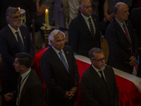 Andres Chadwick, cousin and former minister in the government of Sebastian Pinera, is standing as a guard of honor during the funeral.

Thou...