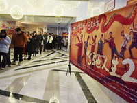 Audiences are lining up to enter a cinema to watch a movie in Fuyang, China, on February 10, 2024. (
