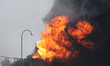 A fire is raging at an oil depot in the Nemyshlianskyi district, Kharkiv, Ukraine, on Febr...