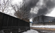 A pillar of smoke is rising from a fire at an oil depot in the Nemyshlianskyi district, Kh...