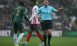 Bali Mumba of Plymouth Argyle is receiving a yellow card during the Sky Bet Championship m...