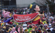 A carnival float featuring a Queen-dressed German politician, Sahra Wagenknecht, is being...