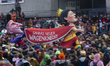 A carnival float featuring a Queen-dressed German politician, Sahra Wagenknecht, is being...