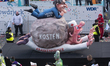 A carnival float featuring German Health Minister Karl Lauterbach is resting on the weight...