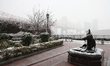 Heavy snow is falling in a park near the Queensboro Bridge as a winter storm hits New York...