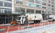 A New York City sanitation vehicle is spreading salt across E. 14th Street after a winter...