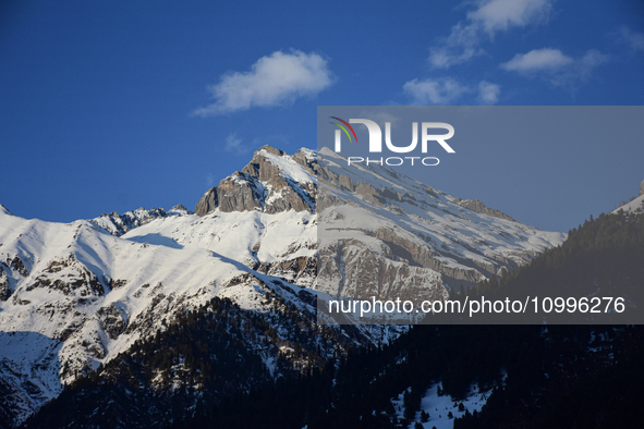 The Alps are covered in snow on a sunny winter day in Sonmarg, a tourist destination in the Ganderbal district of Jammu and Kashmir, on Febr...