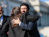 Rep. Alexandria Ocasio-Cortez (D-NY) greets Rep. Greg Casar (D-TX) before a press conference outside of the U.S. Capitol building in Washing...