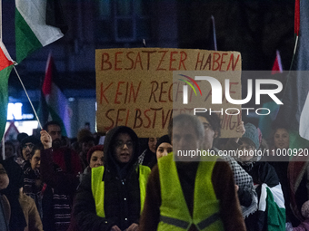 More than a hundred pro-Palestinian protesters are gathering at Muenster Square in the city center of Bonn, Germany, on February 16, 2024, d...