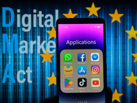 App icons of online platforms such as Google, Facebook, LinkedIn, Amazon, Apple Store, and TikTok are being displayed on a smartphone with t...