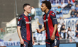 Adama Soumaoro of Bologna is talking with Joshua Zirkzee of Bologna during the Serie A soc...