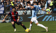 Danilo Cataldi of Lazio is being challenged by Riccardo Orsolini of Bologna during the Ser...