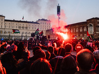 Protesters are attending the demonstration of solidarity and support for Palestine in Piazza Castello, in Turin, Italy, on February 17, 2024...