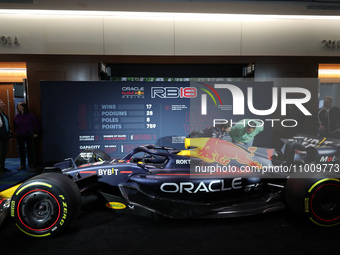 Visitors are looking at the world championship-winning RB18 Formula 1 racing car exhibited at the Canadian International Auto Show in Toront...