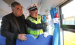 Police are conducting a safety check on a school bus at Erdu Primary School in Huzhou, Chi...