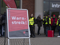 Employees from Postbank branches are going on strike in Essen, Germany, on February 21, 2024, as the Verdi labor union calls for a nationwid...